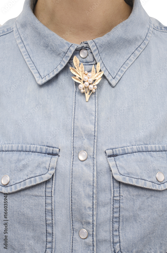 Brooch with pearls on the shirt isolated on white Brooch with pearls on the shirt isolated on white