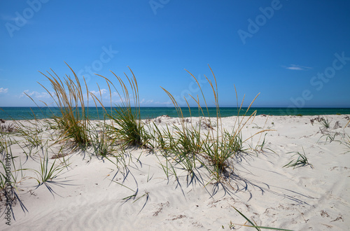 Blue sky  sea and sand on deserted beach