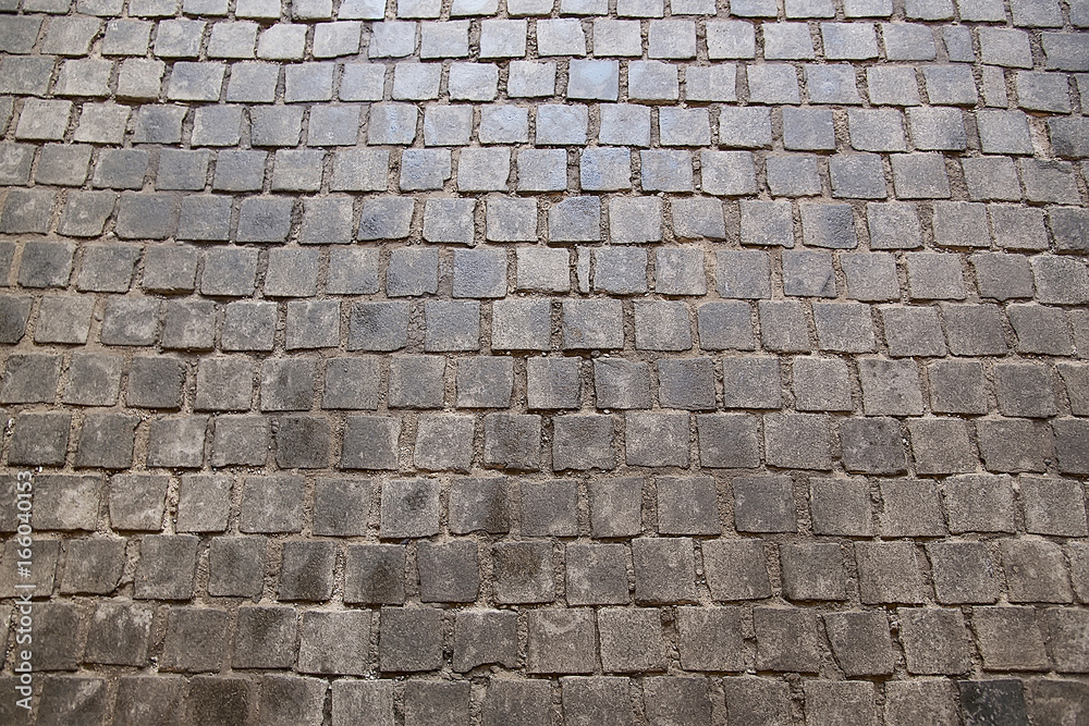 Old grey stone pavement background