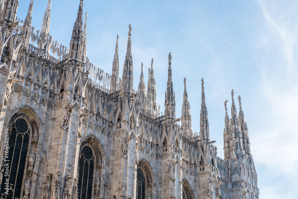 Detail of Milan Cathedral or Duomo di Milano, Gothic church located in the historical center of Milan, Italy.