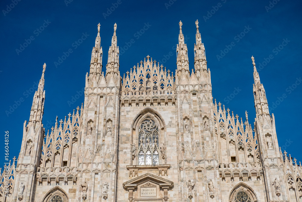 Fototapeta premium Detail of Milan Cathedral or Duomo di Milano, Gothic church located in the historical center of Milan, Italy.