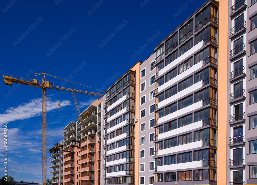 apartment building on blue sky background