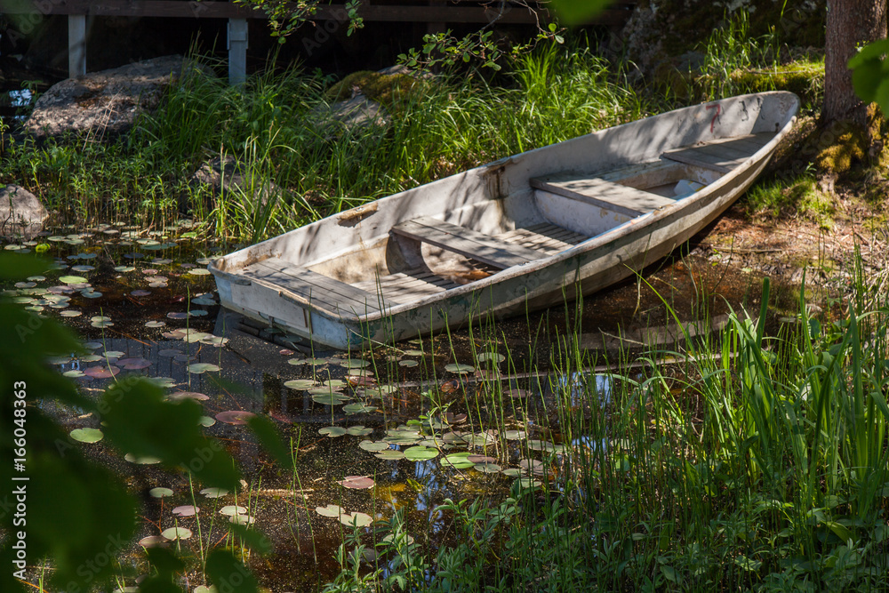 Old boat near the lake in Karelia Old boat near the lake in Karelia