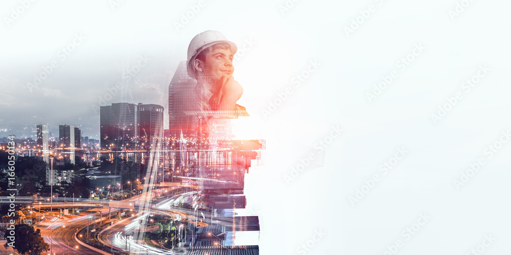 Fotografie Builder man against cityscape