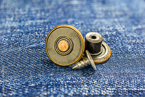 Macro of replace button jeans on indego photo