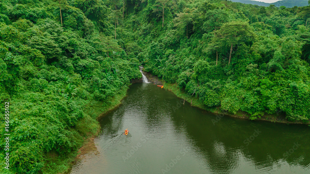 Waterfall in the middle of the forest. Bird eye view , drone Waterfall in the middle of the forest. Bird eye view , drone