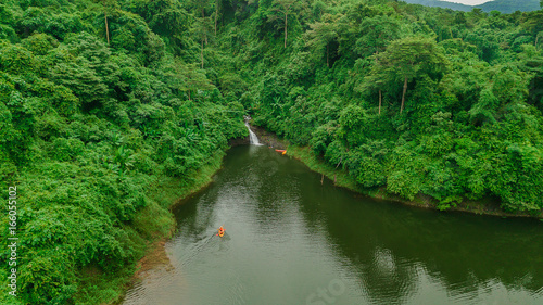 Waterfall in the middle of the forest. Bird eye view , drone