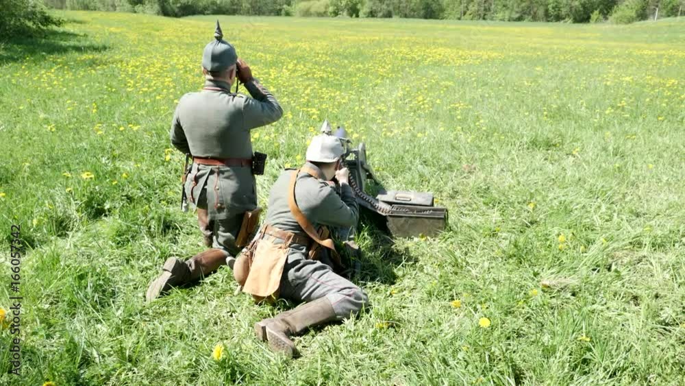 German soldiers shoot from a machine gun German soldiers shoot from a machine gun