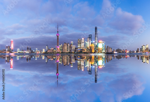 landmarks of Shanghai with Huangpu river at night in China.