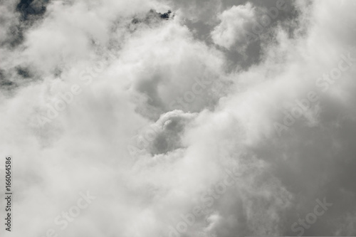 Cloudscape - white clouds making abstract shapes in the sky