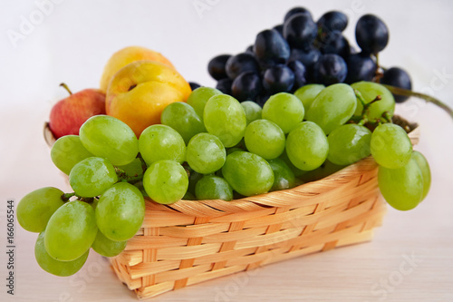 Grapes in a straw basket