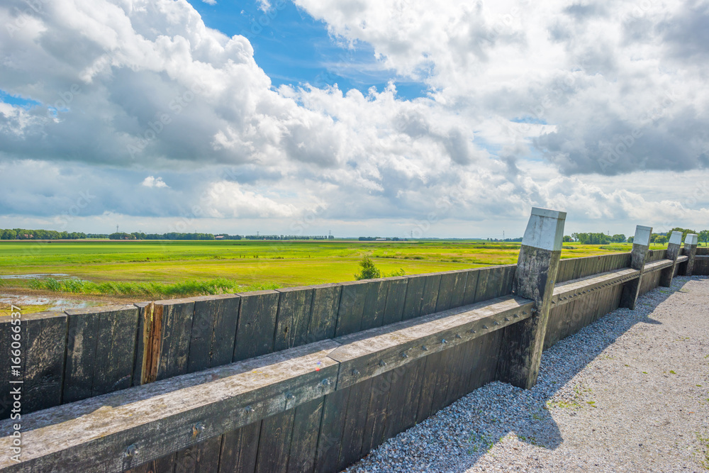 Wooden wall protecting an island against a former sea Wooden wall protecting an island against a former sea