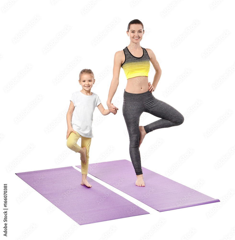 Mother and daughter doing exercise on white background Mother and daughter doing exercise on white background