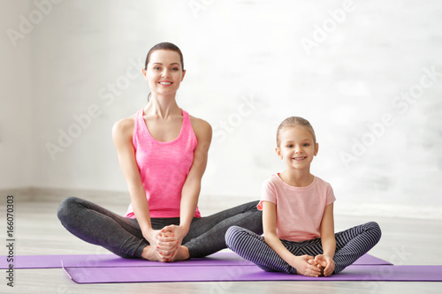 Mother and daughter doing e...