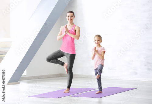 Mother and daughter doing e...