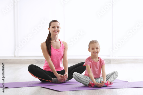 Mother and daughter doing e...