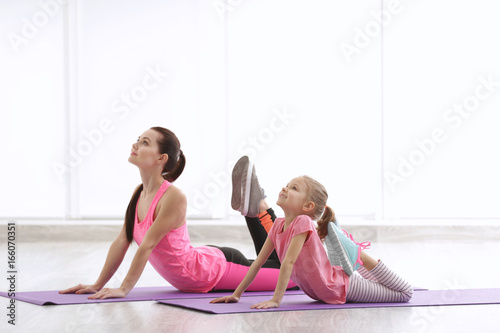 Mother and daughter doing e...