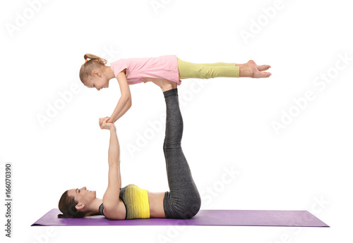 Mother and daughter doing e...