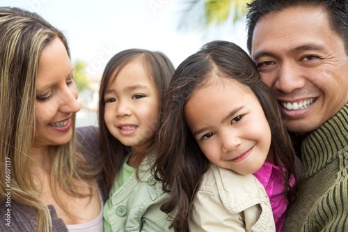 Mixed race family.