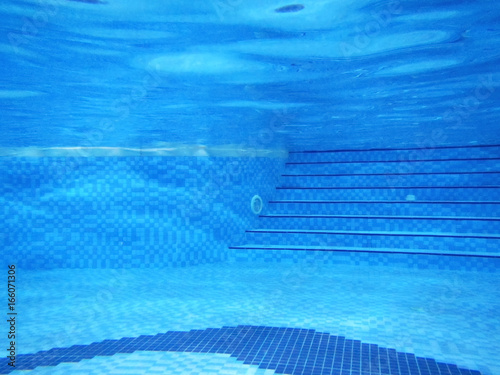 View of swimming pool underwater © Africa Studio