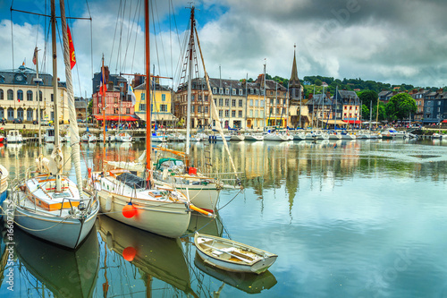 Traditional houses and boats in the old harbor, Honfleur, France
