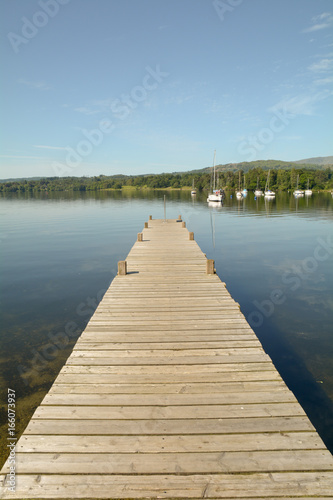 Wooden jetty on Lake Windermere near Ambleside in the Lake District Cumbria England © martincp