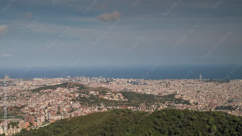 timelpase of the barcelona city skyline in the afternoon with beautiful light timelpase of the barcelona city skyline in the afternoon with beautiful light