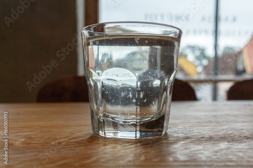 A glass of water on the table in the restaurant