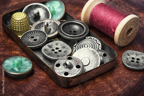 Old-fashioned button and thread