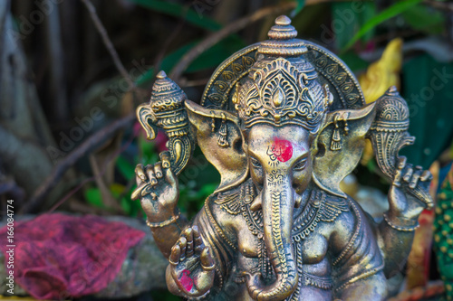 hindu god ganesha statue under sun light