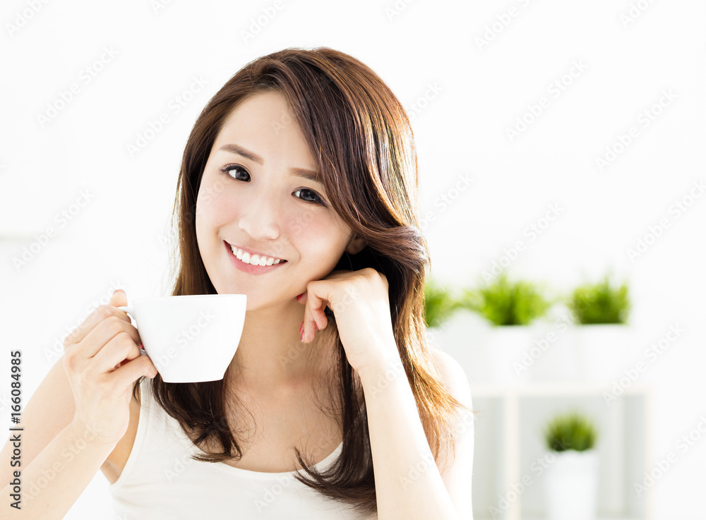 beautiful young woman drinking coffee beautiful young woman drinking coffee