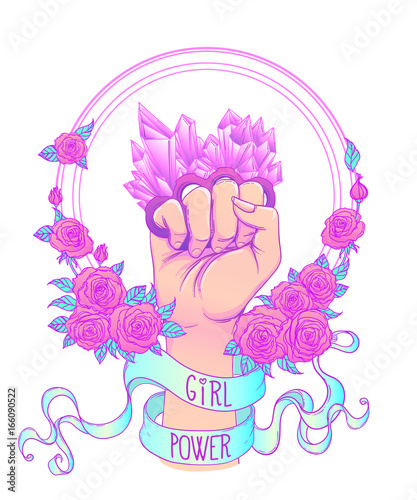 Fight like a girl. Woman's hand with crystal quartz brass knuckles. Fist raised up. Girl Power. Feminism concept.