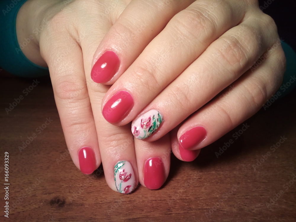The manicurist excellently made her work a beautiful manicure with a polish gel on her hands and the client is happy The manicurist excellently made her work a beautiful manicure with a polish gel on her hands and the client is happy