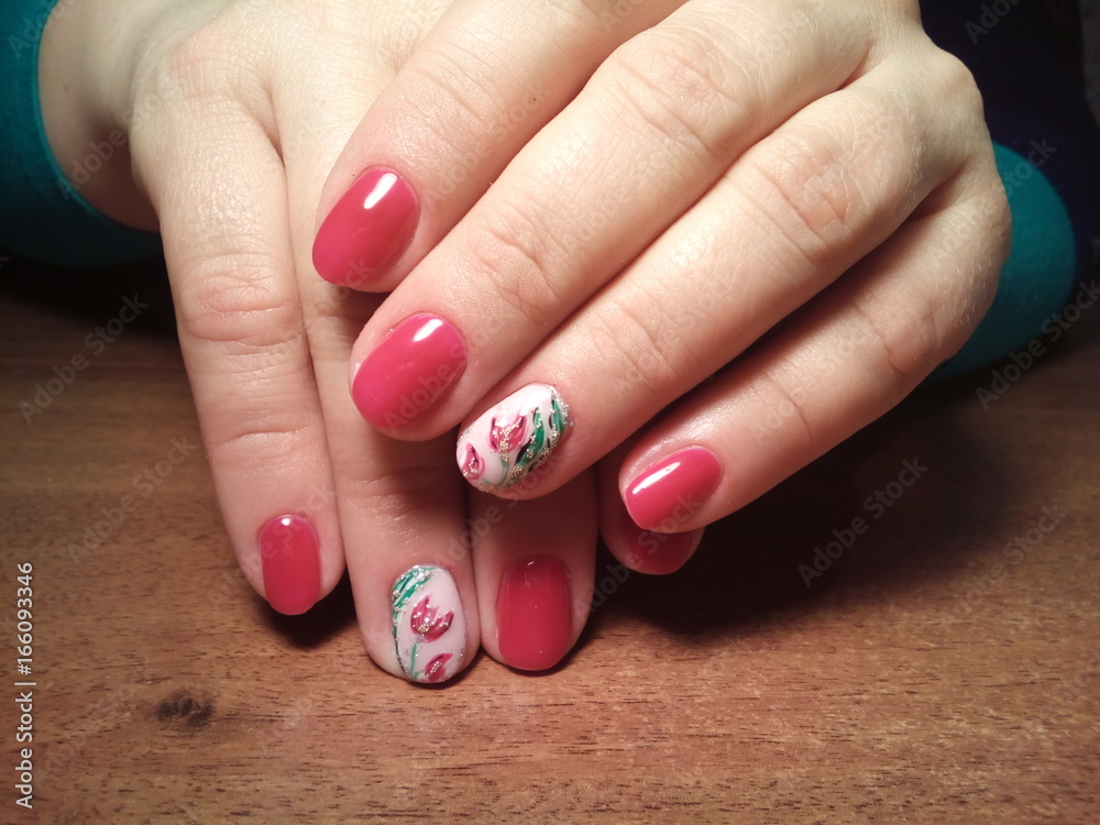 The manicurist excellently made her work a beautiful manicure with a polish gel on her hands and the client is happy The manicurist excellently made her work a beautiful manicure with a polish gel on her hands and the client is happy