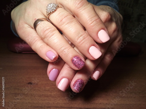 Wallpaper Mural The manicurist excellently made her work a beautiful manicure with a polish gel on her hands and the client is happy Torontodigital.ca