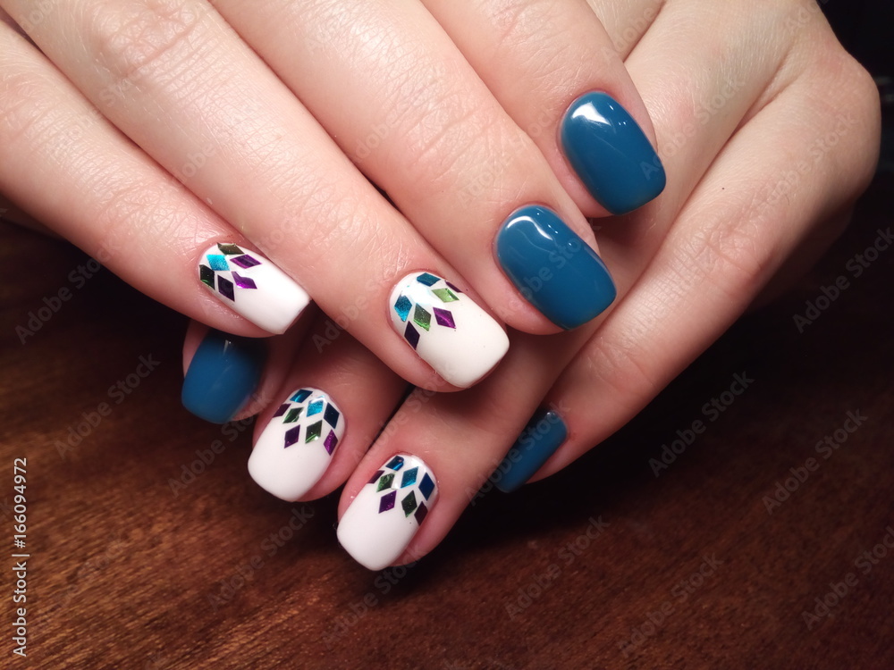 The manicurist excellently made her work a beautiful manicure with a polish gel on her hands and the client is happy The manicurist excellently made her work a beautiful manicure with a polish gel on her hands and the client is happy