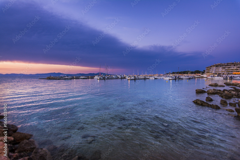 Sunset in quiet port of l'Escala, Costa Brava.