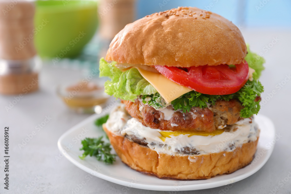 Tasty turkey burger on table