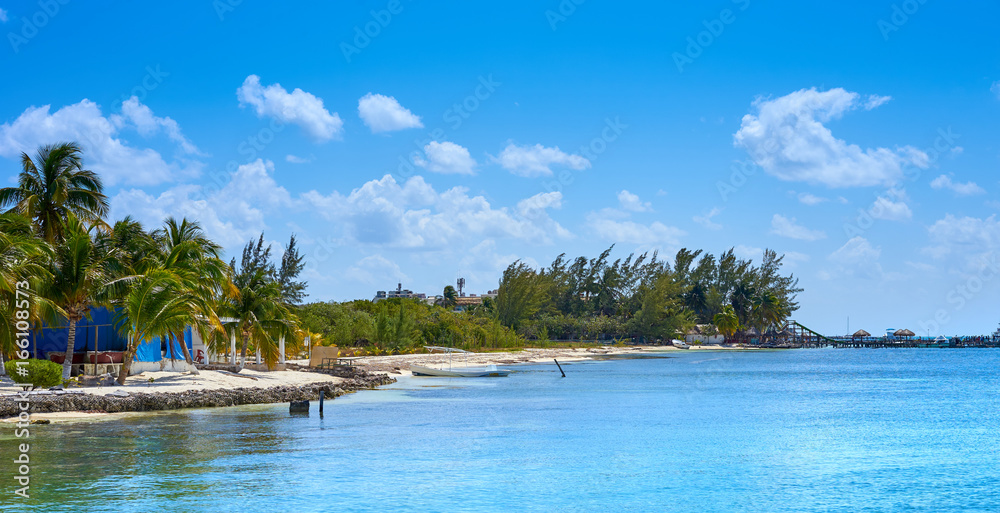 Peaceful bay with fishing boat on caribbean island / Very calm bay with turtle farm on so called island of 