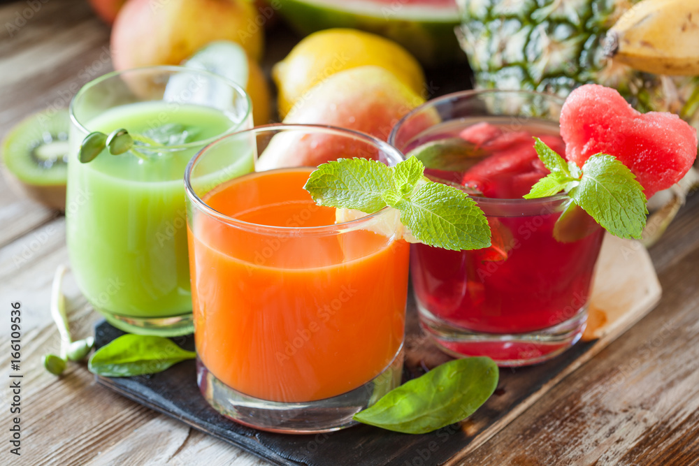 Fototapeta premium Assorted fresh fruit and vegetable juices