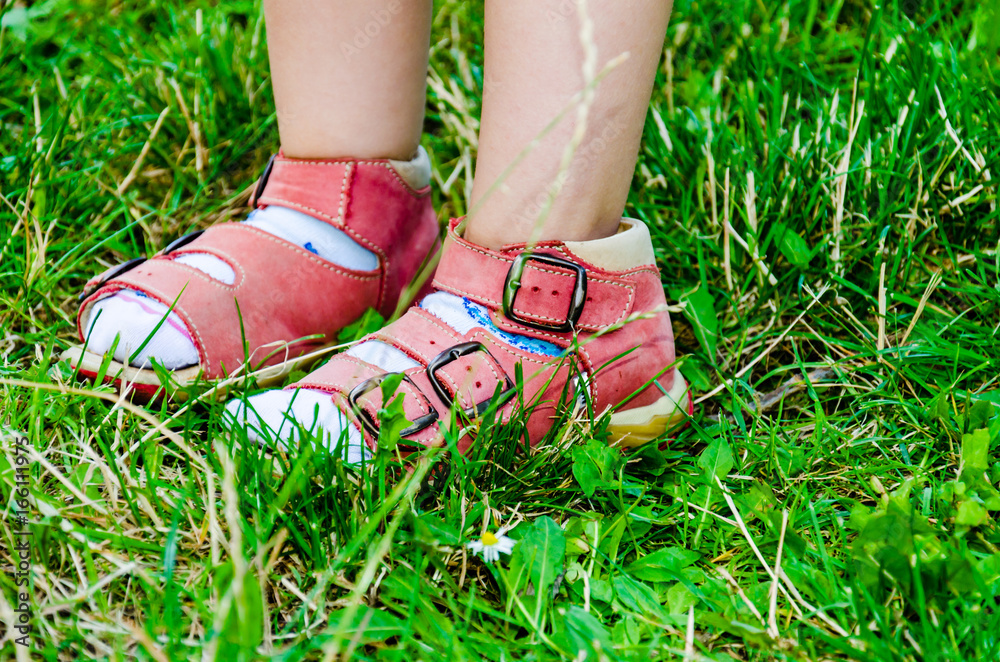 Children in red sandals