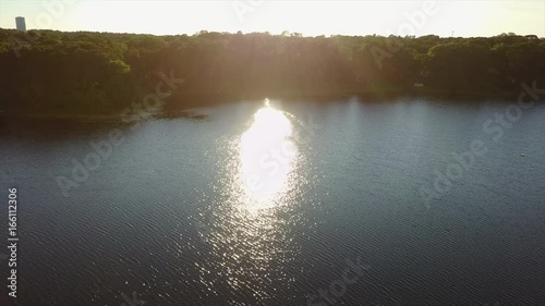 Aerial of Lake and Afternoon Sunlight on Cape Cod photo