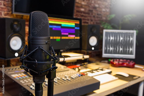 condenser microphone in digital sound editing & recording studio photo