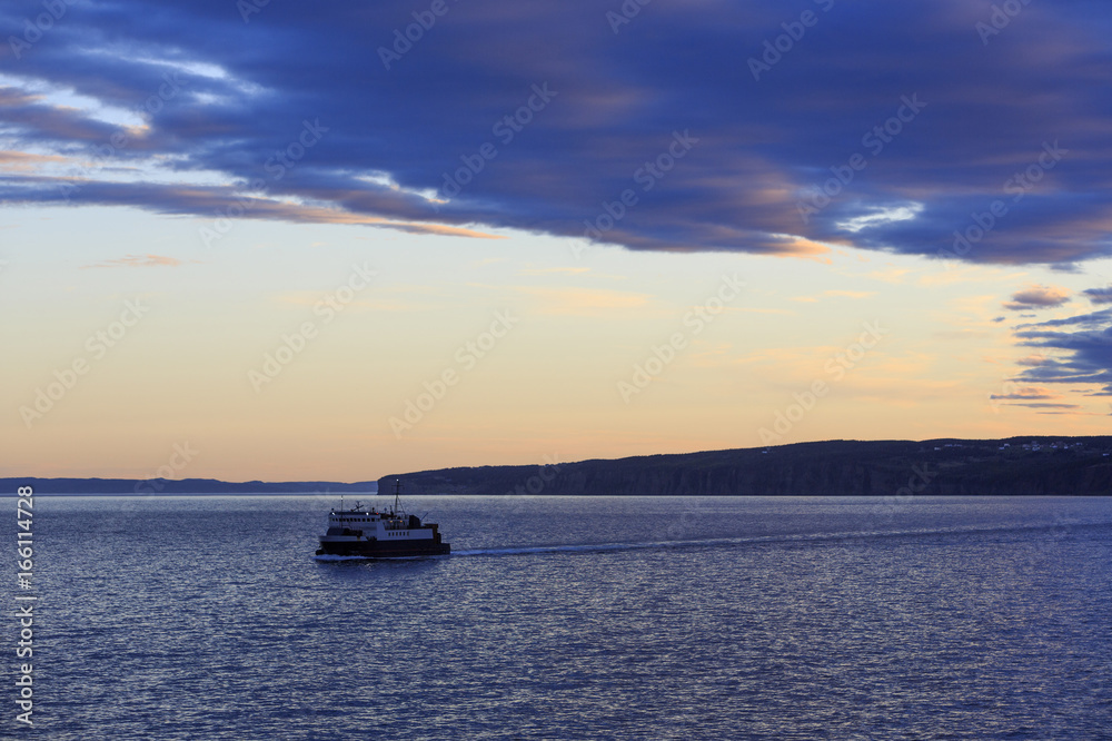 Ferry boat carrying cars and people