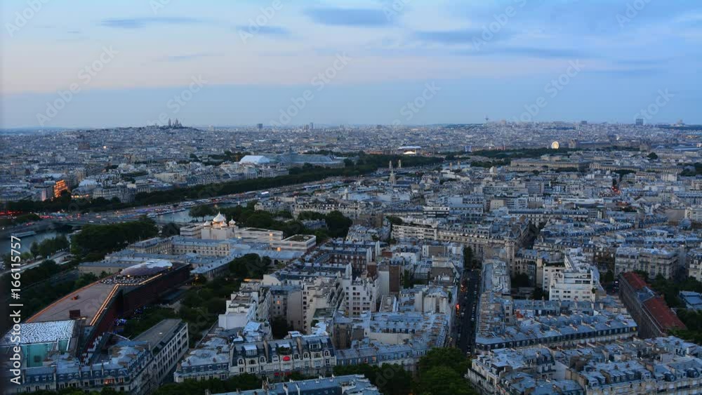 Panoramic view of Paris from the top of the Eiffel tower at sunset. Time Lapse. Panoramic view of Paris from the top of the Eiffel tower at sunset. Time Lapse.