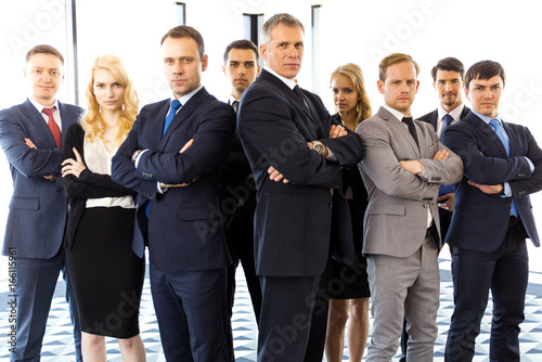 Business people with arms crossed