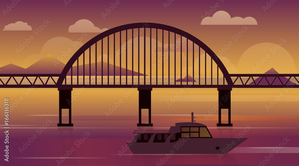 Bridge over the water and the ship at sunset