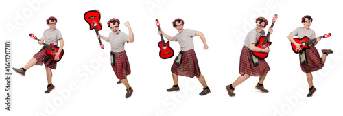 Scotsman playing guitar isolated on white