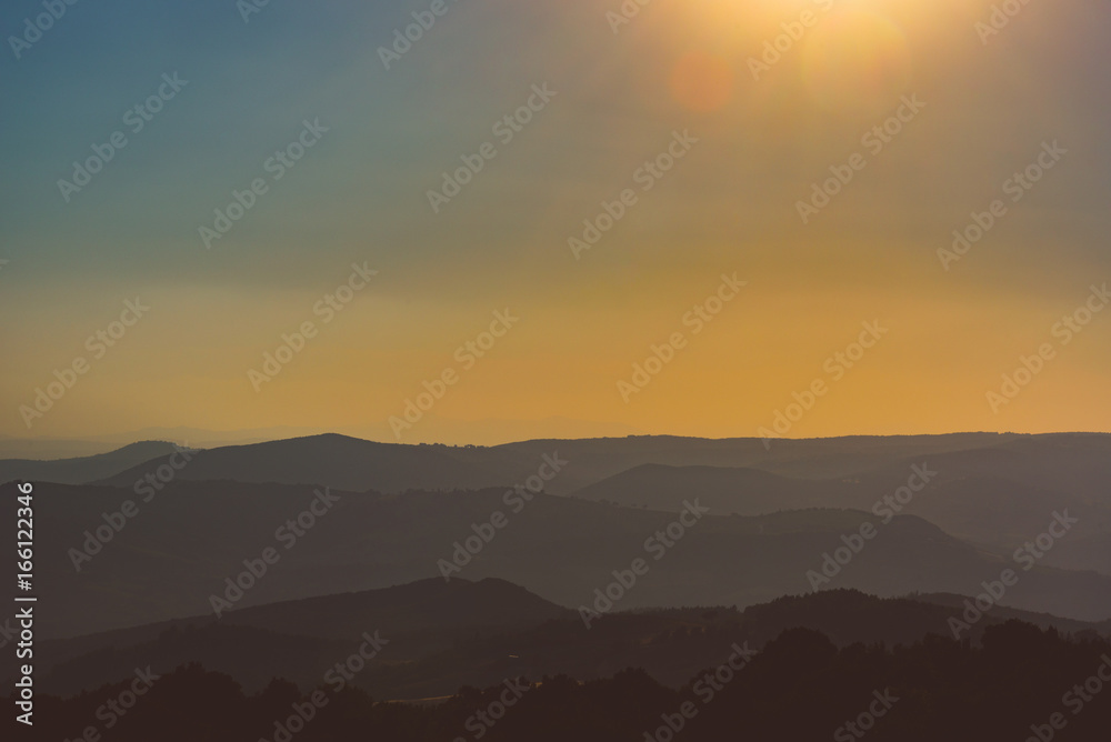 Layers of hills at sunset