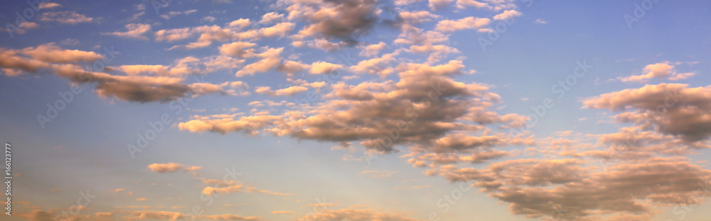 blue sky background with clouds at sunset